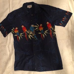 A Hawaiian shirt from Hawaii! Pacific Legend apparel parrot border pattern.